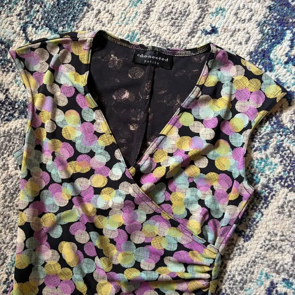 Connected multicoloured polka dot dress with a tie waist.‎ Size: S